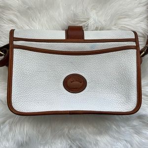 White Vintage Equestrian model Dooney and Burke Cross body purse.